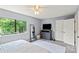 Bright bedroom with large window, closet, dresser, and ceiling fan at 1420 11Th Street Nw Dr # 15, Hickory, NC 28601