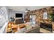 Cozy living room featuring stone accent wall, fireplace, and sliding glass doors to an outdoor space at 1420 11Th Street Nw Dr # 15, Hickory, NC 28601
