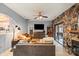 Bright living room featuring stone accent wall, neutral paint, and modern furnishings at 1420 11Th Street Nw Dr # 15, Hickory, NC 28601