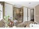 Bathroom featuring a glass shower, double doors, and a granite countertop sink at 16402 Doves Canyon Ln, Charlotte, NC 28278