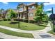 Beautiful stone home with a well-manicured lawn on a corner lot at 16402 Doves Canyon Ln, Charlotte, NC 28278