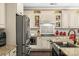 Well-equipped kitchen with granite countertops, stainless steel appliances, and ample storage at 16402 Doves Canyon Ln, Charlotte, NC 28278