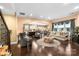 Spacious living room with hardwood floors, stylish seating, and an open layout at 16402 Doves Canyon Ln, Charlotte, NC 28278