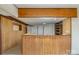The basement features wood paneling and bar area for entertaining and relaxation at 165 Fieldstone Farm Dr, Statesville, NC 28625