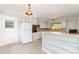 Bright kitchen with white cabinets, ample counter space, and modern appliances at 165 Fieldstone Farm Dr, Statesville, NC 28625