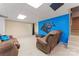 Finished basement with large seating area and entertainment space with team decor at 1701 Whitney Ln, Salisbury, NC 28146