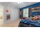 A great bedroom featuring custom paint, a ceiling fan, and natural light from a window at 1701 Whitney Ln, Salisbury, NC 28146