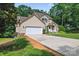 Inviting two-story home with a long driveway and attached two-car garage at 1701 Whitney Ln, Salisbury, NC 28146