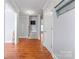 Welcoming foyer with wood floors, a staircase, and neutral wall colors at 1701 Whitney Ln, Salisbury, NC 28146