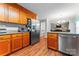 Open-concept kitchen with granite counters and stainless appliances at 1701 Whitney Ln, Salisbury, NC 28146