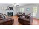 Comfortable living room with wood floors, fireplace, and ample seating area at 1701 Whitney Ln, Salisbury, NC 28146