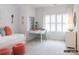 Bright bedroom with a daybed, cozy seating, and a desk by the window, perfect for a space at 2008 Thatcher Way, Fort Mill, SC 29715