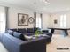 Expansive living area featuring a large sectional sofa, recessed lighting, bike decor, and a pool table at 2008 Thatcher Way, Fort Mill, SC 29715
