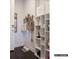 Organized mudroom with white shelving, hooks, and convenient storage for pet supplies near the home's entryway at 2008 Thatcher Way, Fort Mill, SC 29715