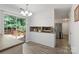 Bright kitchen with stainless steel appliances, granite counters, and access to the outdoor deck at 2012 Killarney Pl, Charlotte, NC 28262