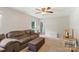 Spacious living room showcases plush seating and a window that provides a view of the outdoors at 2012 Killarney Pl, Charlotte, NC 28262