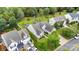 Aerial view showcases a spacious home with lush greenery, a patio, and a gazebo, nestled in a serene neighborhood at 2026 Rosewater Ln, Indian Trail, NC 28079