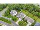 Overhead view of a property with a well-maintained yard, a gazebo, and mature trees in a suburban setting at 2026 Rosewater Ln, Indian Trail, NC 28079