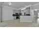 Open kitchen with modern stainless steel appliances and blue cabinetry at 2026 Rosewater Ln, Indian Trail, NC 28079