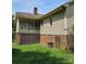 The home's exterior has a screened in back porch and a brick foundation at 217 Rock Creek Dr, Lincolnton, NC 28092