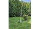 Landscaped yard with well maintained lawn and mature rose bushes at 217 Rock Creek Dr, Lincolnton, NC 28092