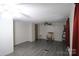 A cozy living room with wood-look floors, featuring a ceiling fan and a rocking chair at 220 Singing Pine Dr, Clover, SC 29710