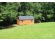 Exterior view of a shed on a vast green lawn at 220 Singing Pine Dr, Clover, SC 29710