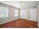 Bedroom featuring two windows, ceiling fan, and closet at 2239 Blue Hampton Ln, Charlotte, NC 28213