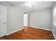 Bedroom with window, ceiling fan, and wood flooring at 2239 Blue Hampton Ln, Charlotte, NC 28213