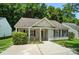 Charming single-story home features light siding, a well-manicured lawn, and a welcoming entrance at 2239 Blue Hampton Ln, Charlotte, NC 28213
