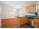 Kitchen with stainless steel appliances, stone countertop and open floorplan at 2239 Blue Hampton Ln, Charlotte, NC 28213