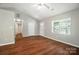 Open living room with vaulted ceilings, hardwood floors, and lots of natural light at 2239 Blue Hampton Ln, Charlotte, NC 28213