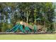Fun playground area with slides, swings, and climbing structures, surrounded by mature trees at 240 Orson Oaks Ln, Pineville, NC 28134