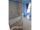 Bright bathroom boasts a relaxing soaking tub, providing the ultimate spa-like experience at 29 Willow St, Badin, NC 28009
