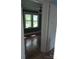 Bedroom with hardwood floors features a window providing a sun-filled space at 29 Willow St, Badin, NC 28009