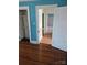 Hardwood floors flow from one room to the next in this cozy home at 29 Willow St, Badin, NC 28009