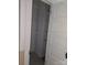An interior view of a storage closet featuring shelving and a clothing rod for organized storage solutions at 29 Willow St, Badin, NC 28009