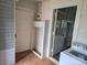 View of hallway with access to laundry room and pantry at 29 Willow St, Badin, NC 28009