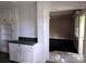 Bright kitchen with built in shelving at 29 Willow St, Badin, NC 28009