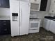 Kitchen appliances, refrigerator, and countertops at 29 Willow St, Badin, NC 28009