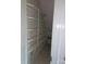 View of the walk-in pantry with shelving at 29 Willow St, Badin, NC 28009