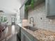 Kitchen featuring granite countertops and view to living room at 3007 Arsdale Rd, Waxhaw, NC 28173