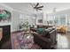 Bright living room with fireplace and view of the backyard at 3007 Arsdale Rd, Waxhaw, NC 28173