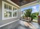 Relaxing covered porch featuring a charming porch swing at 3007 Arsdale Rd, Waxhaw, NC 28173