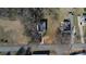 Aerial view of home, yard, and neighborhood, on a sunny day with dormant trees at 305 E Henry St, Belmont, NC 28012