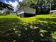 Large, well-maintained yard offering plenty of room for outdoor enjoyment and potential landscaping projects at 305 E Henry St, Belmont, NC 28012