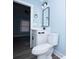 Fresh bathroom features vanity, sleek black fixtures, and view of a bedroom at 305 E Henry St, Belmont, NC 28012
