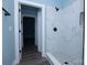 Elegant bathroom boasts walk-in shower with stylish tile and glass partition, plus open doorway at 305 E Henry St, Belmont, NC 28012