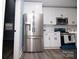 Bright kitchen featuring stainless steel refrigerator and built-in microwave at 305 E Henry St, Belmont, NC 28012