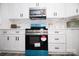 Bright kitchen featuring a Frigidaire oven and built-in microwave at 305 E Henry St, Belmont, NC 28012